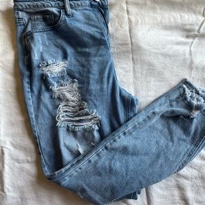 High waisted distressed jeans